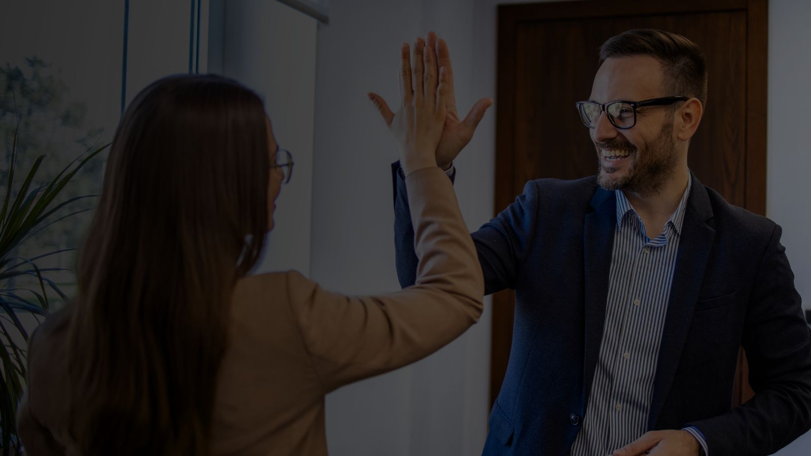 Two people celebrating