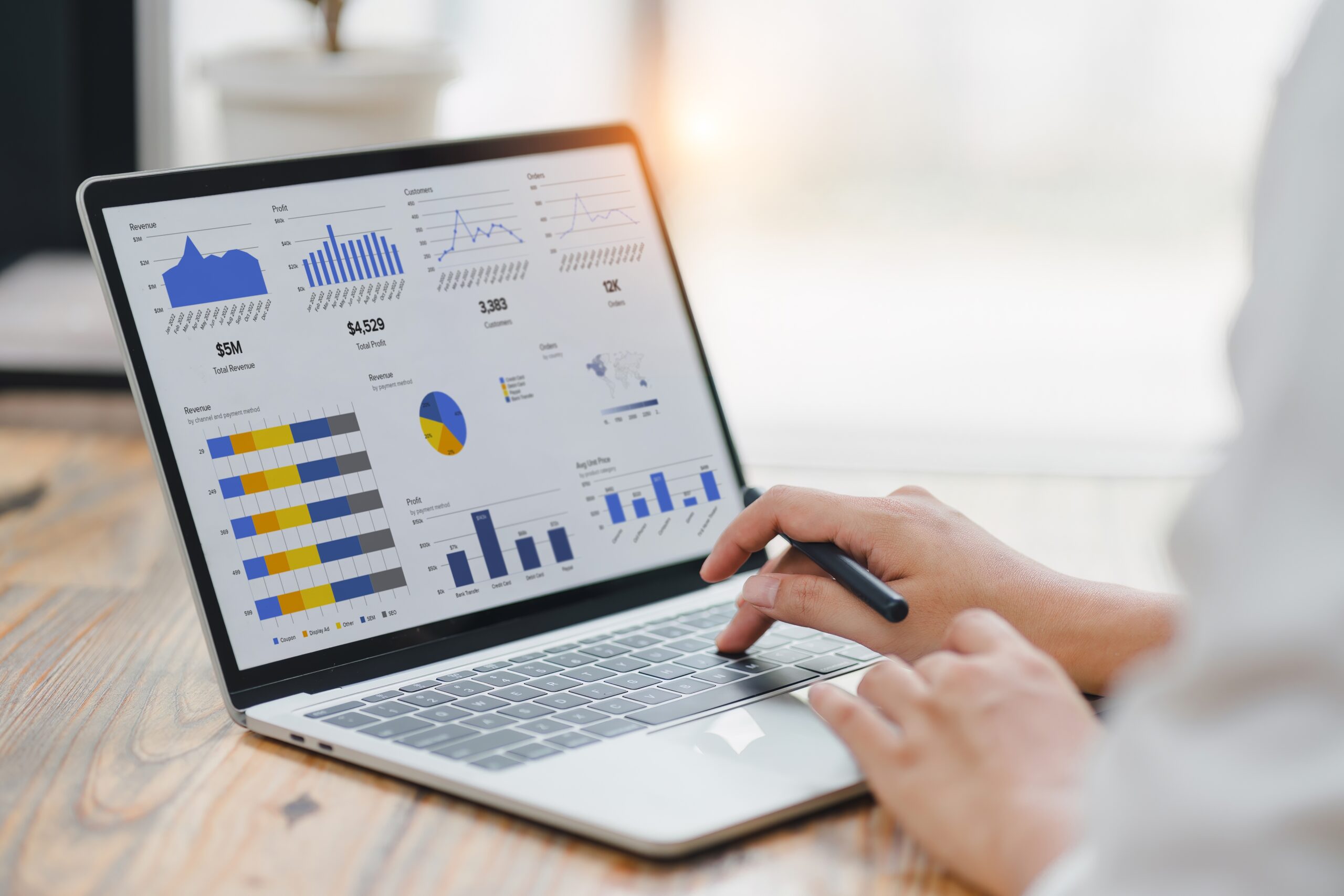 Professional,Analyzing,Financial,Data,Graphs,,Charts,On,Laptop,Display,At