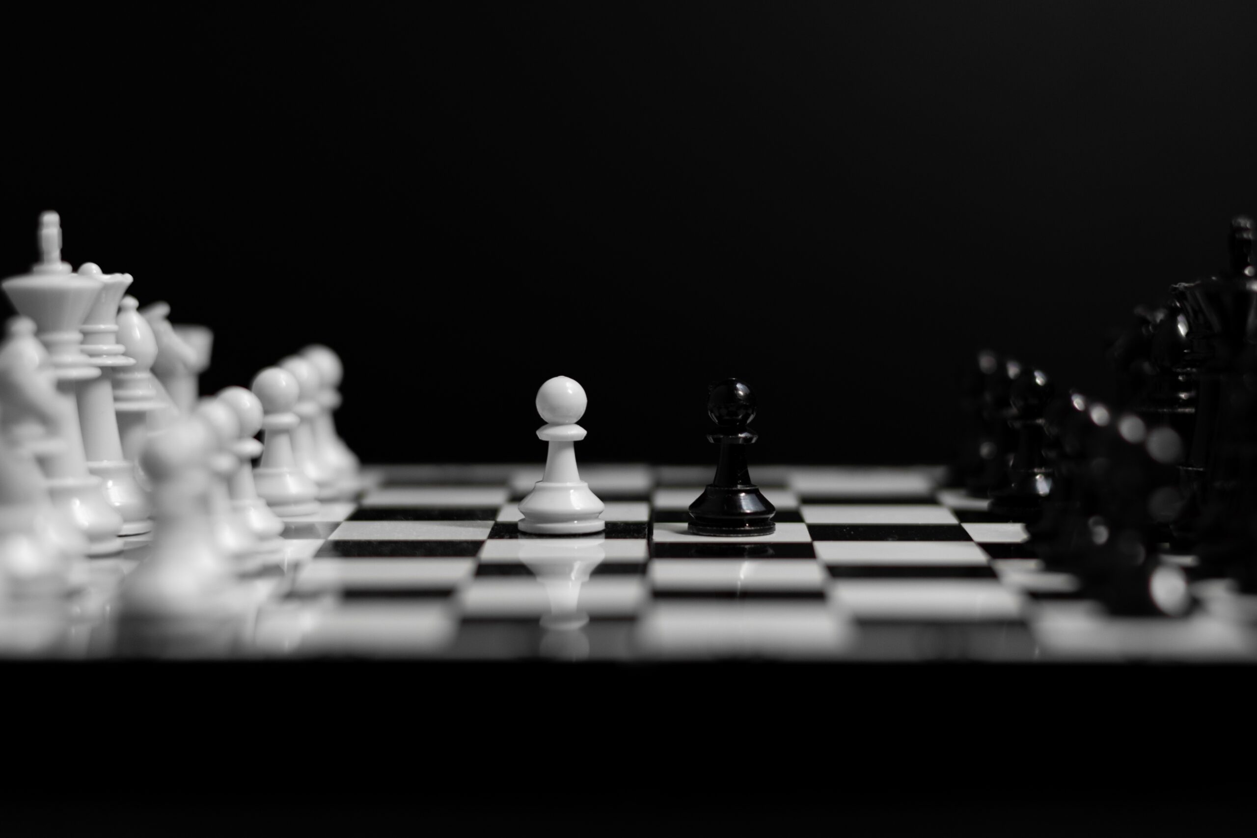 Black,And,White,Chessboard,,With,Two,Pawns,Faced,To,Each