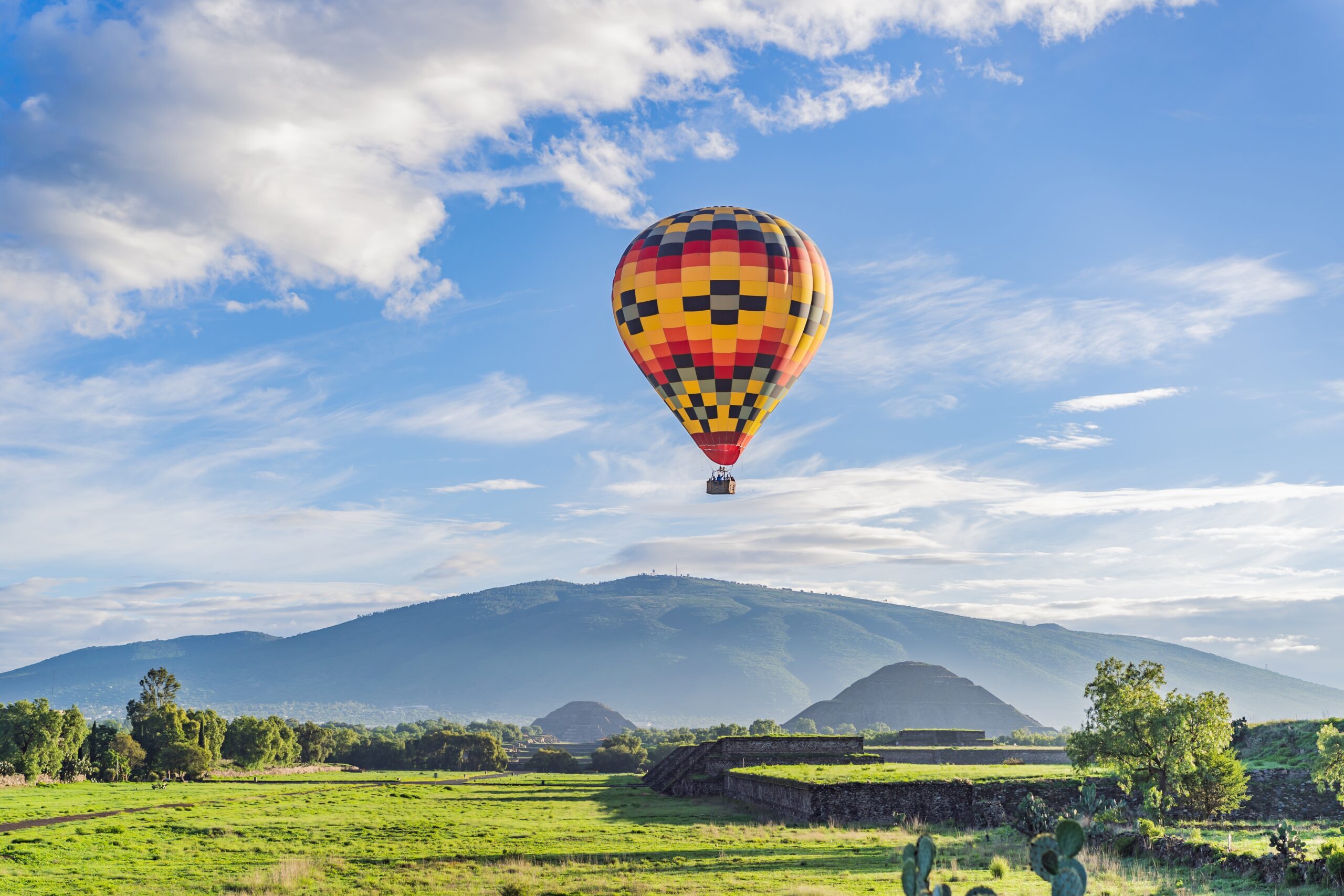 An,Aerial,View,Of,Hot,Air,Balloons,Above,The,Teotihuacan