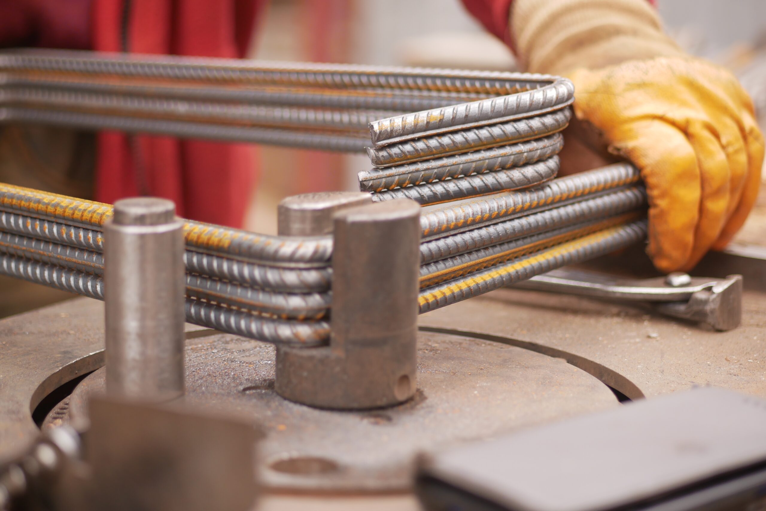 Steel,Reinforcement,Bars,Being,Shaped,At,A,Construction,Site